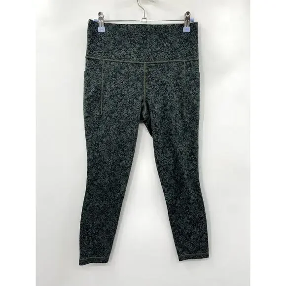 Athleta green patterned Salutation stash pocket 7/8 leggings - Picture 2 of 4